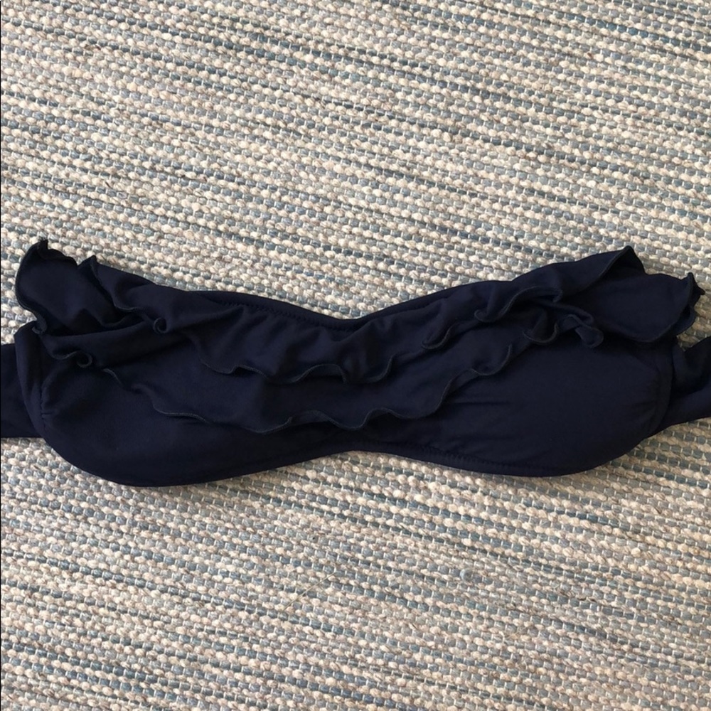 Pily Q navy strapless bikini top.)